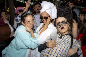 Tenerife Carnival 2026 street party with colorful costumes and crowds dancing in Santa Cruz Plaza de España