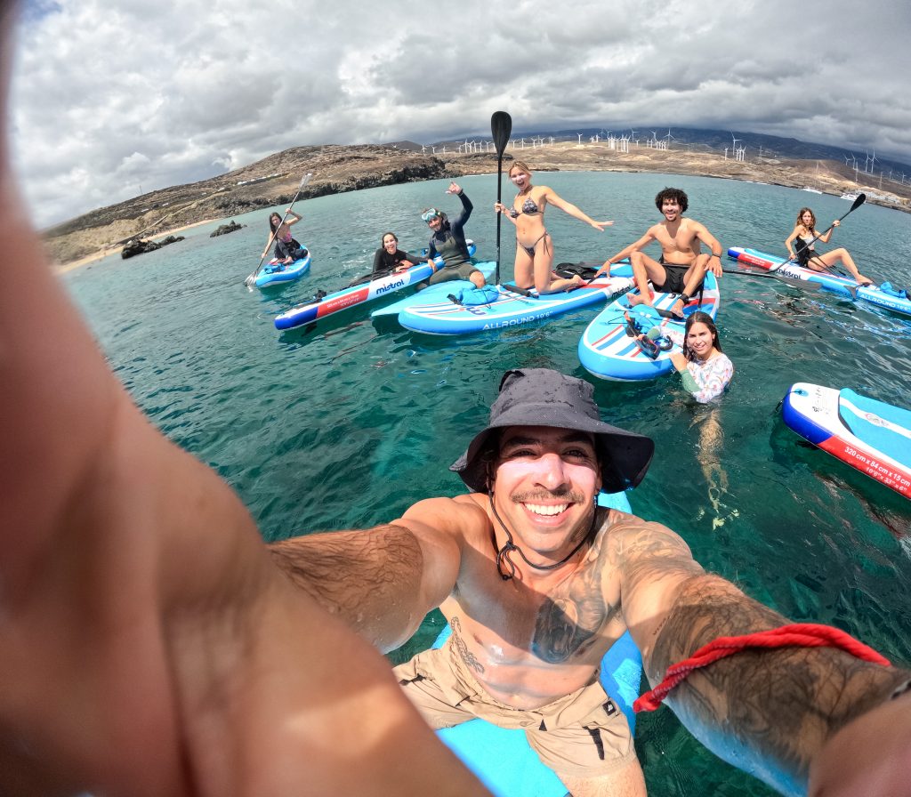 Snorkeling in the crystal-clear waters of Tenerife South, spotting tropical fish near Costa Adeje.